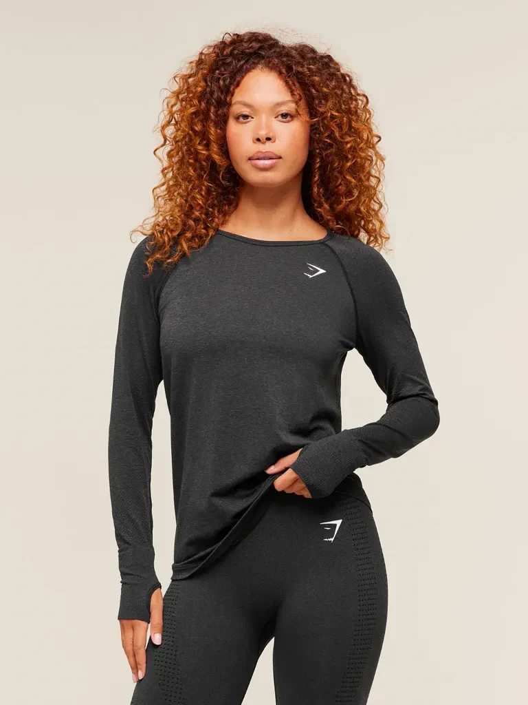 Dark activewear top and leggings used as the clothing reference
